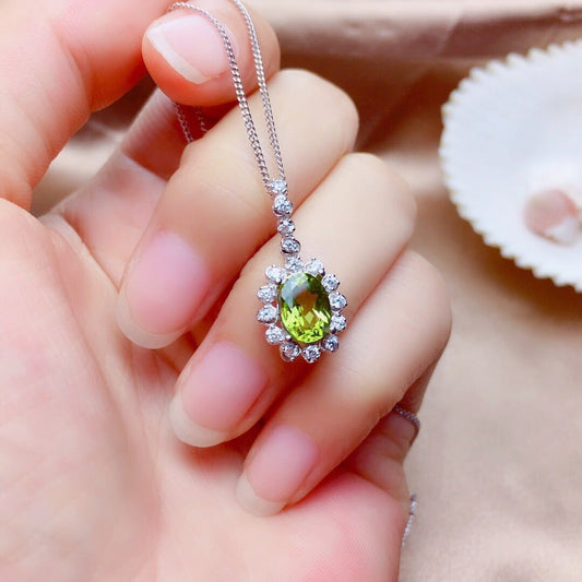 Elara Olivine Cristal - ALIZAElara Olivine CristalElara Olivine CristalElara Olivine CristalWomen AccessoriesALIZAALIZA62779713Auréline Verdant StudsElara Olivine Cristal